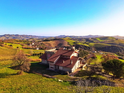 Large house high above Offida